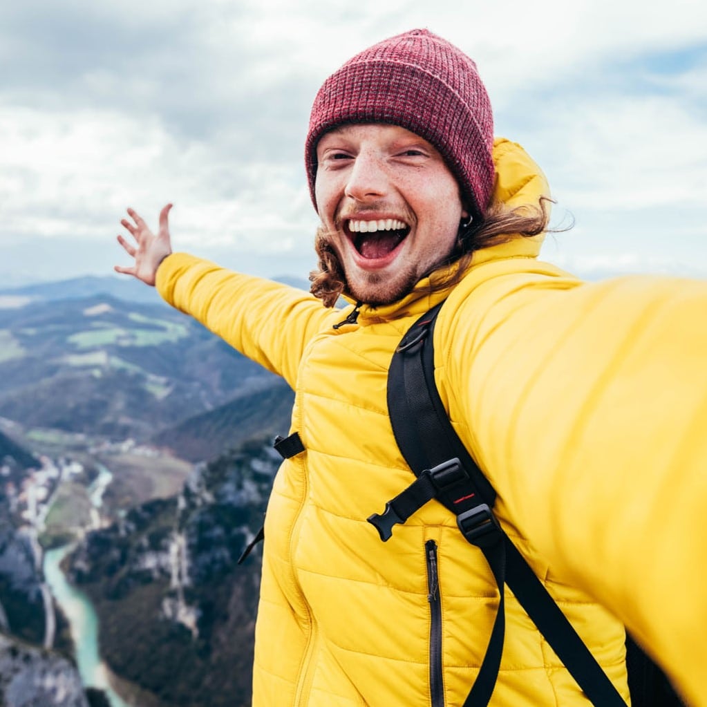 happy guy on the mountain